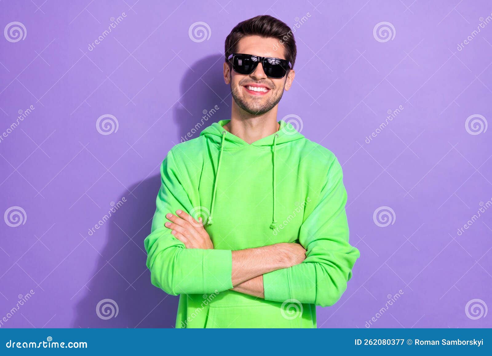 photo of rich positive influencer hold folded hands wear green pullover expensive sunglasses rayban nightclub 