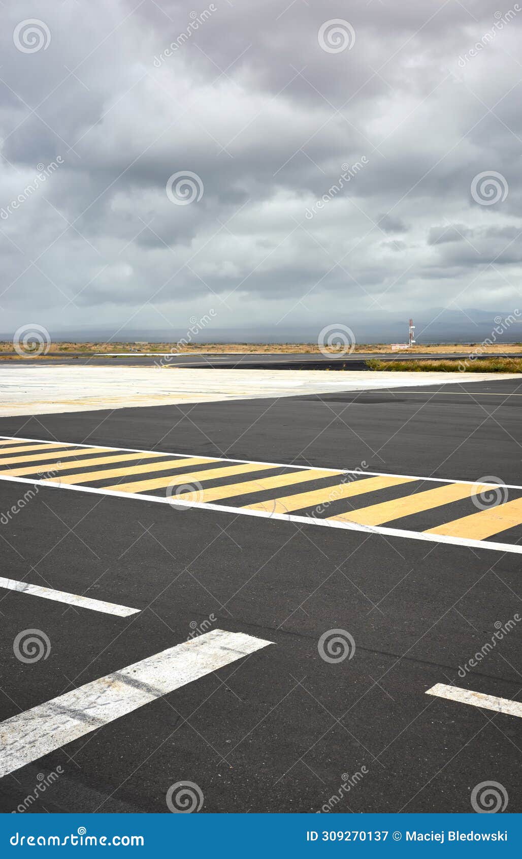 photo of the runway on baltra island, selective focus, galapagos islands, ecuador