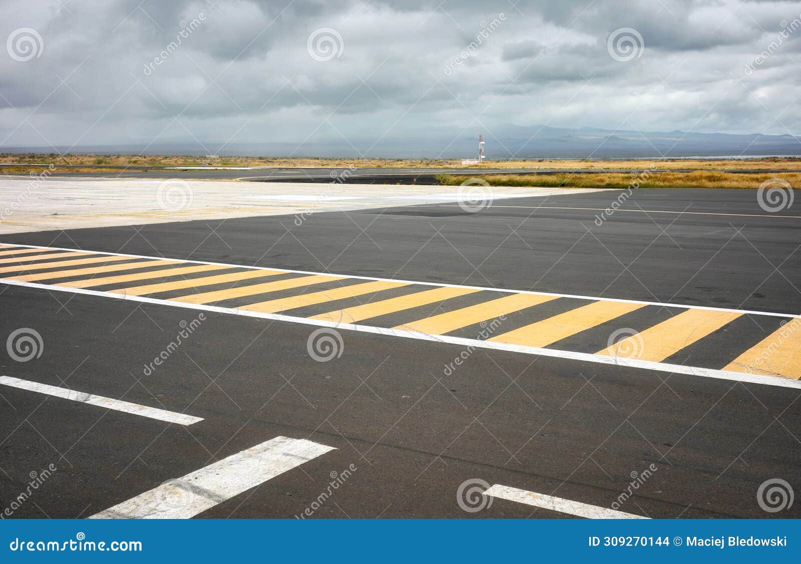 photo of the runway on baltra island, selective focus, galapagos islands, ecuador