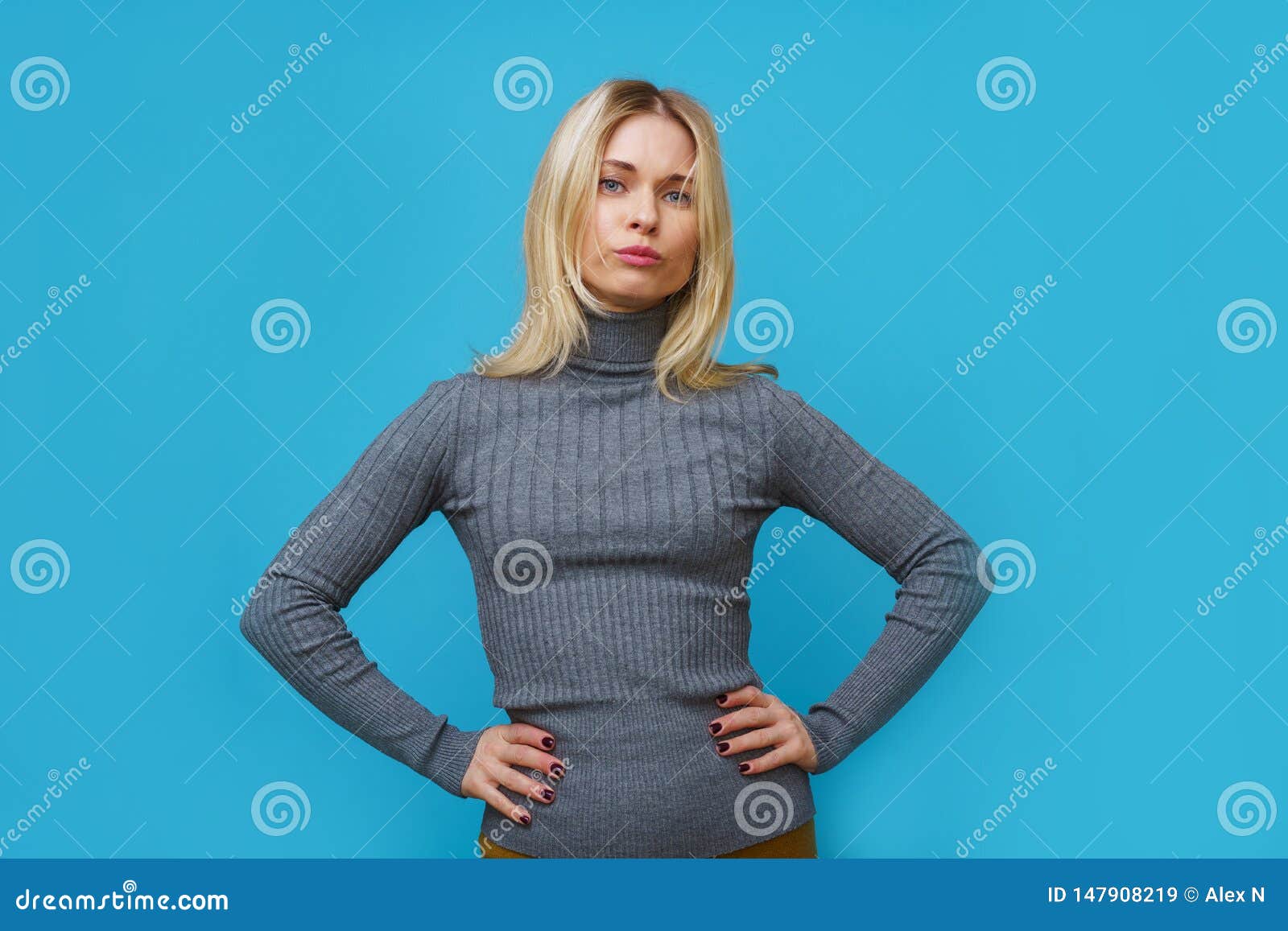Serious Blonde Woman with Hair in Bun - wide 4