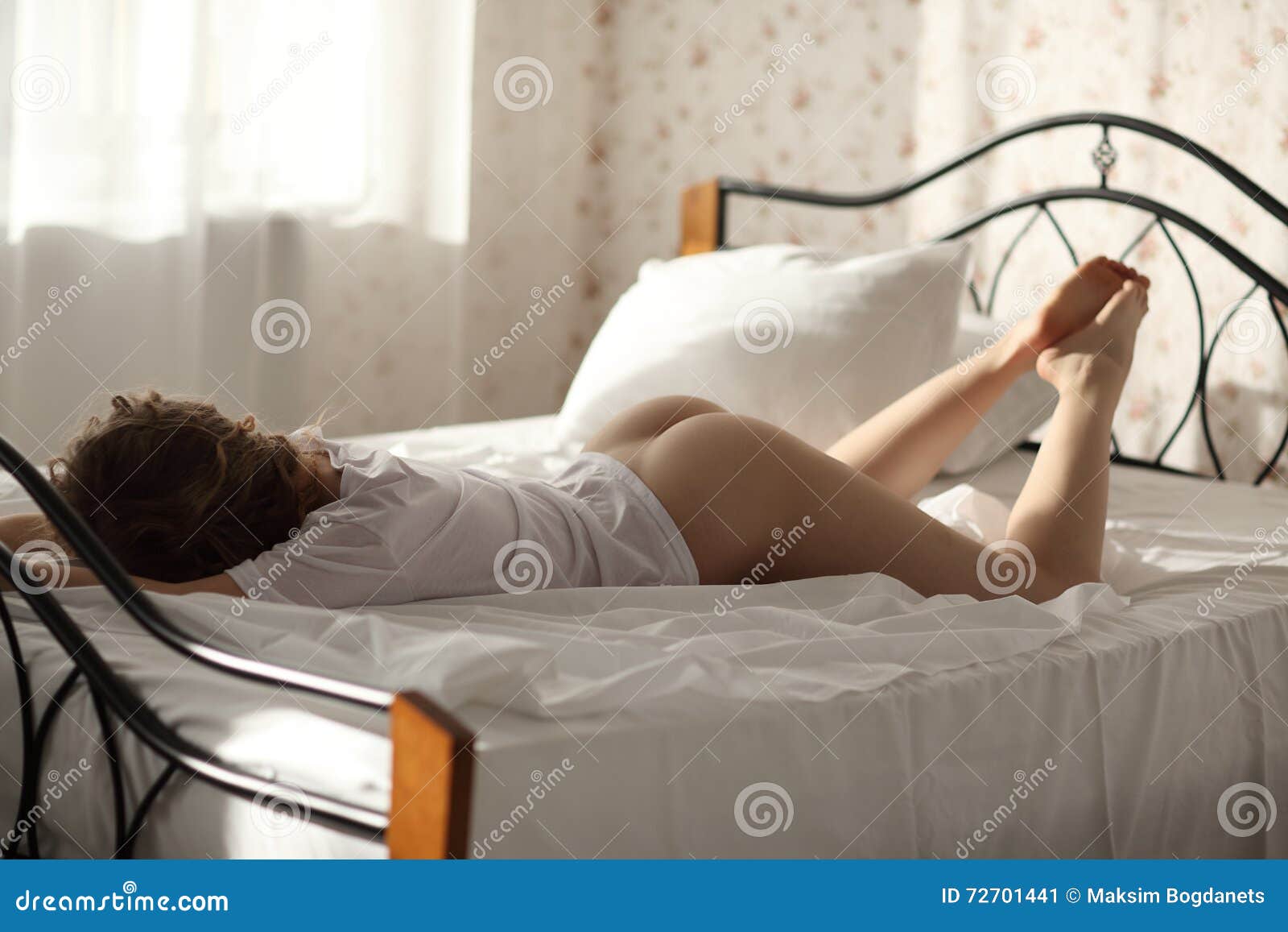 Photo of Sexual Blond Woman Lying Naked in Bed, Relaxing Stock Image pic photo