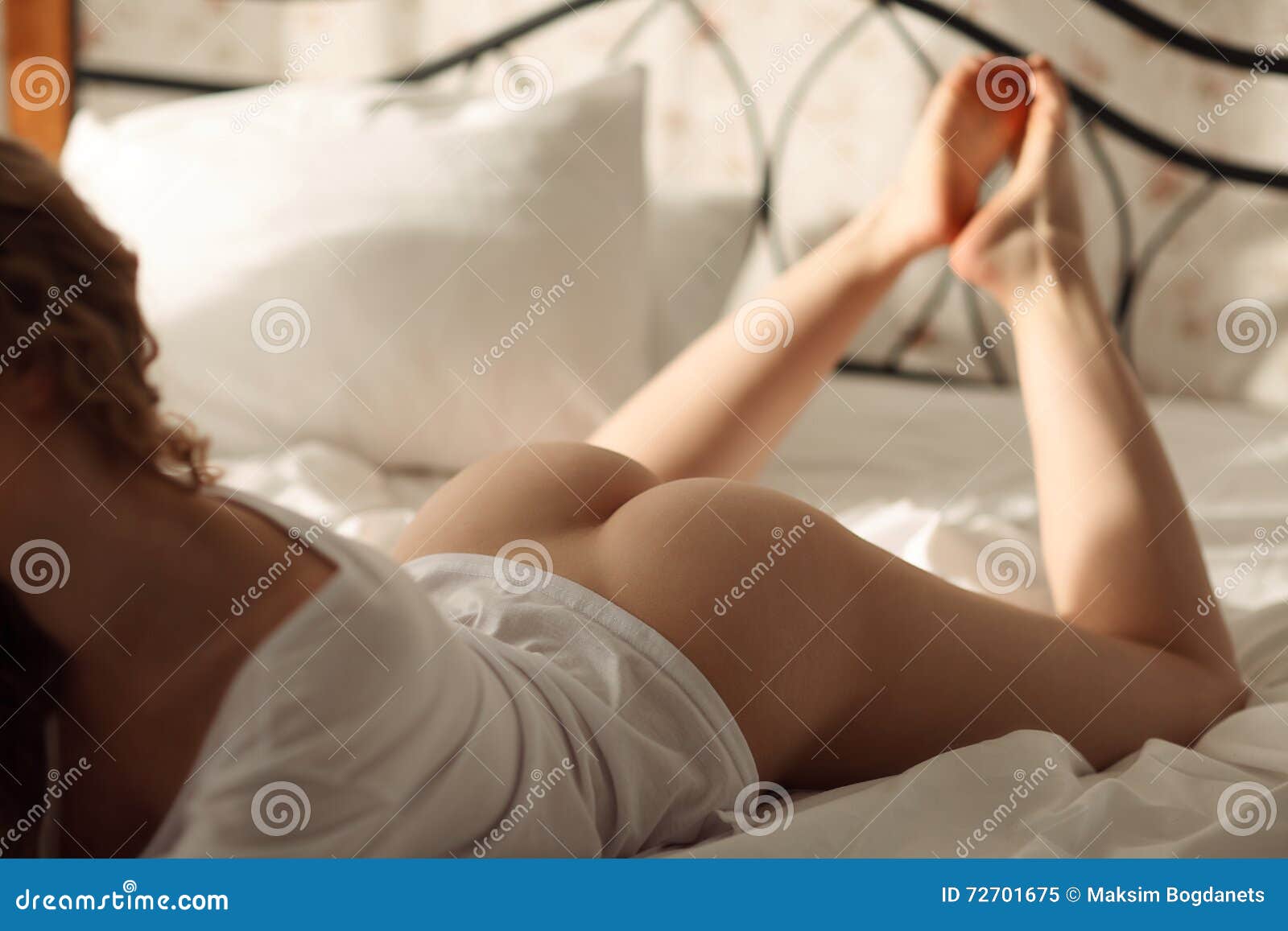 Photo of Sexual Blond Woman Lying Naked in Bed, Relaxing Stock Image pic