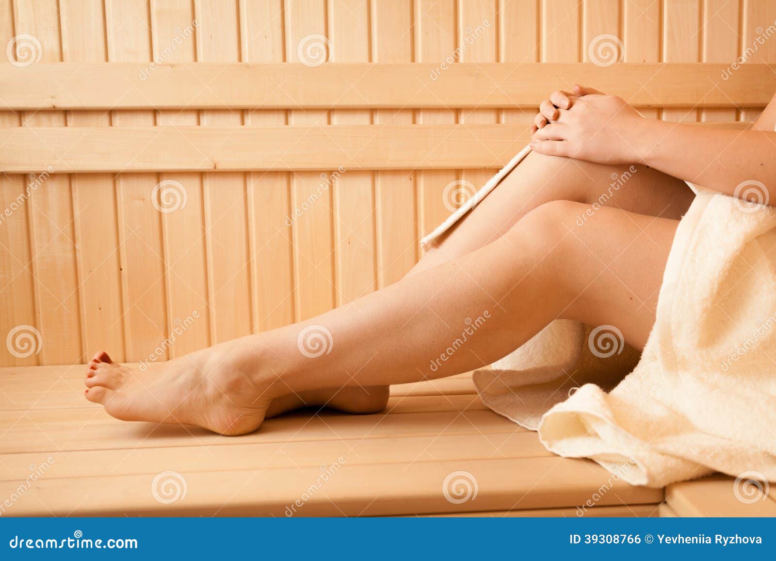 Photo of women feet at sauna. Closeup photo of woman feet at sauna