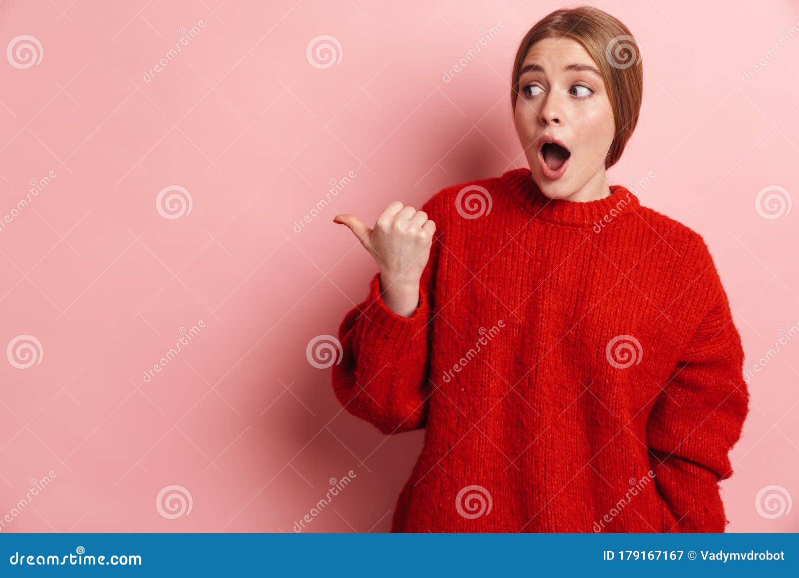 Photo Of Shocked Woman Expressing Surprise And Pointing Finger Aside Stock Image Image Of