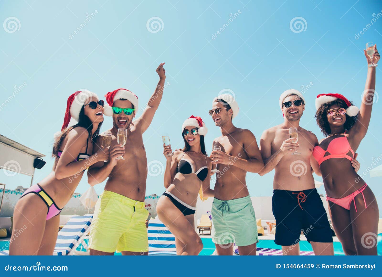 Photo of Six Multinational Friends Celebrating New Year at Tropics Hanging  Out Cool Bikini Feast Stock Image - Image of champagne, resort: 154664459