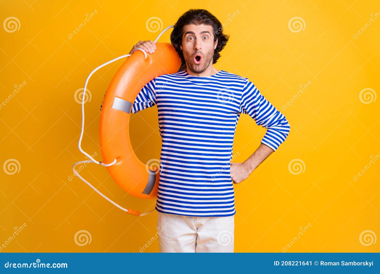 Photo of Surprised Guy Hold Lifesaver Wear White Shorts Nautical Vest  Isolated Over Shine Yellow Color Background Stock Image - Image of journey,  lifeguard: 208221641