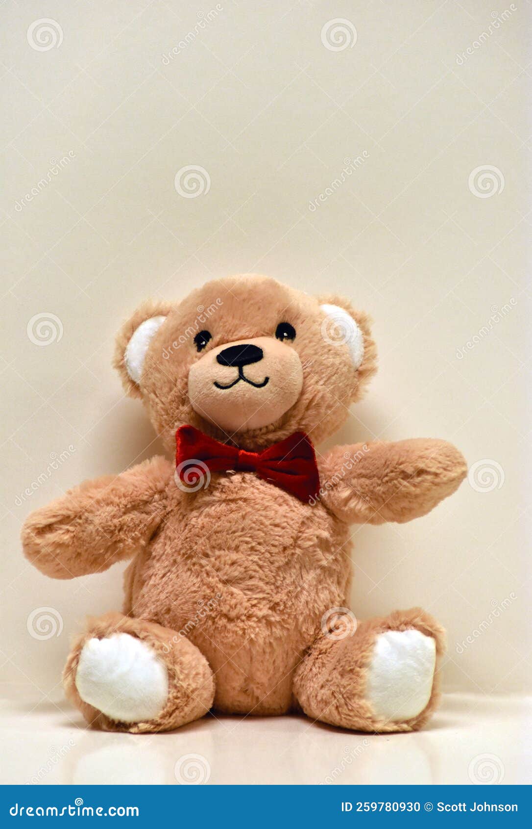Tan Toy Stuffed Teddy Bear with a Red Bow Tie Stock Photo Image of