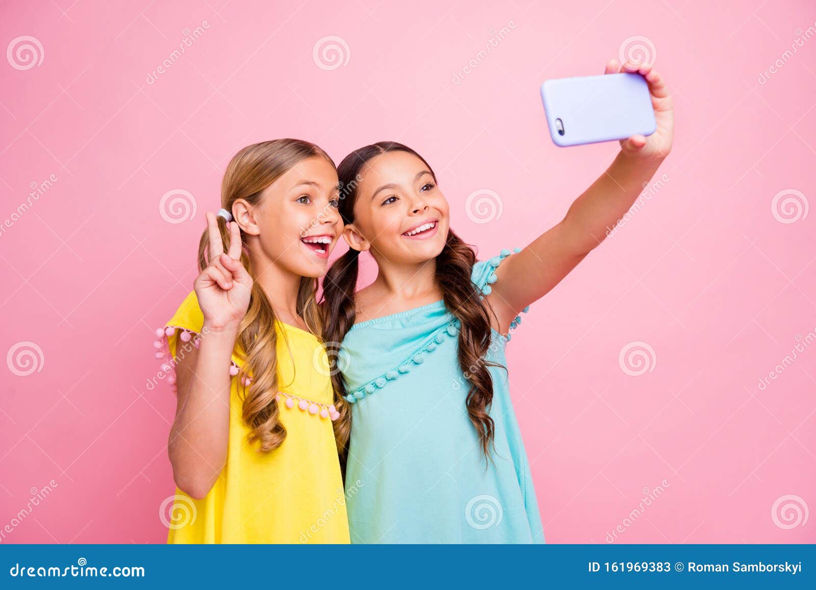 Photo of Two Blond Brunette Small Ladies Models Classmates Holding ...