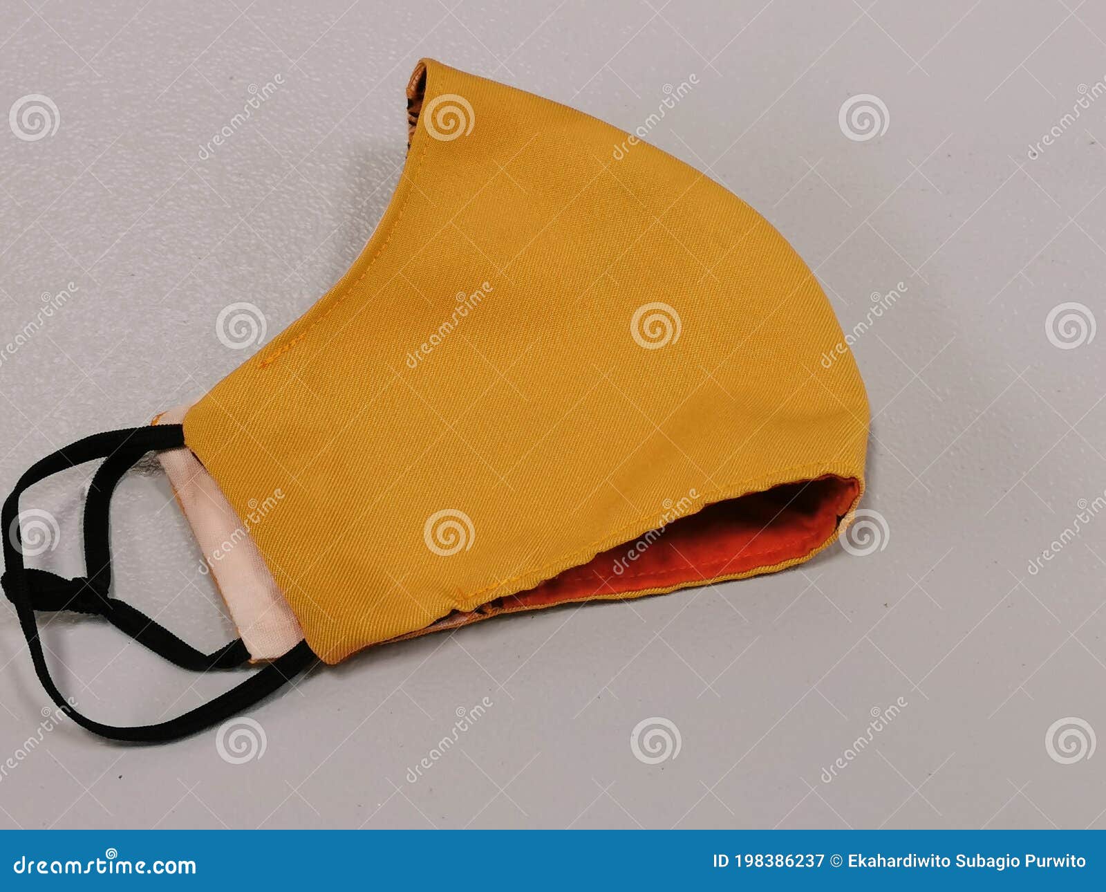 photo of used fabric mask on the table.