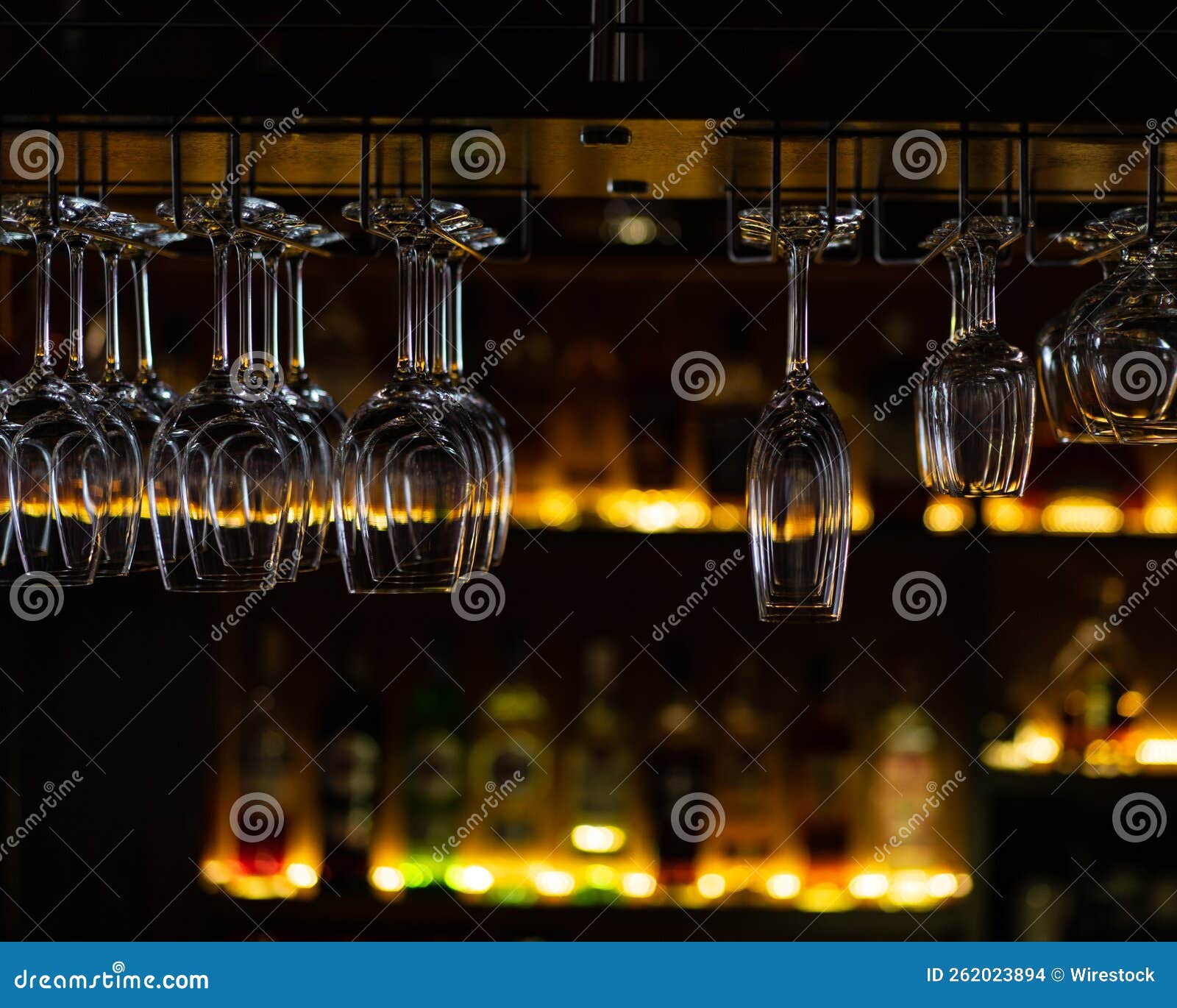 Photo of Wine Glasses in a Bar Stock Photo Image of light