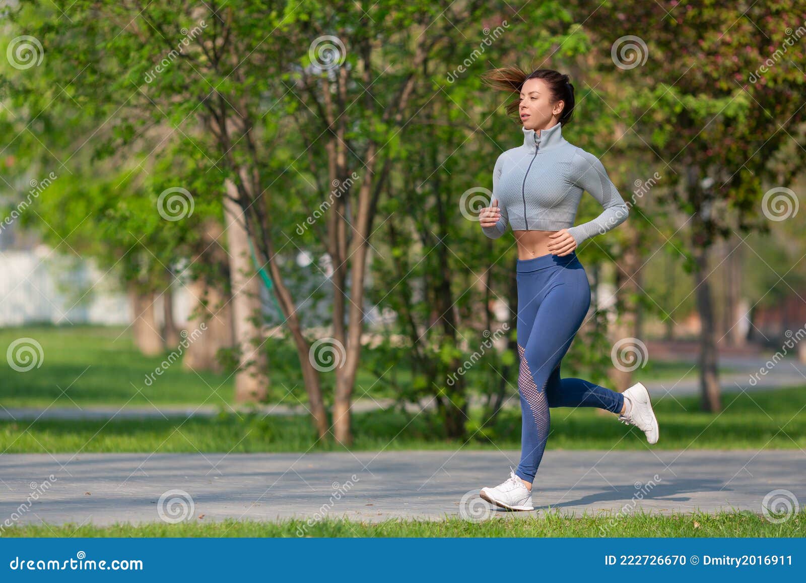 Photo of a Woman Running in Park in Early Morning. Attractive Looking Woman  Keeping Fit and Healthy Stock Photo - Image of workout, caucasian: 222726670