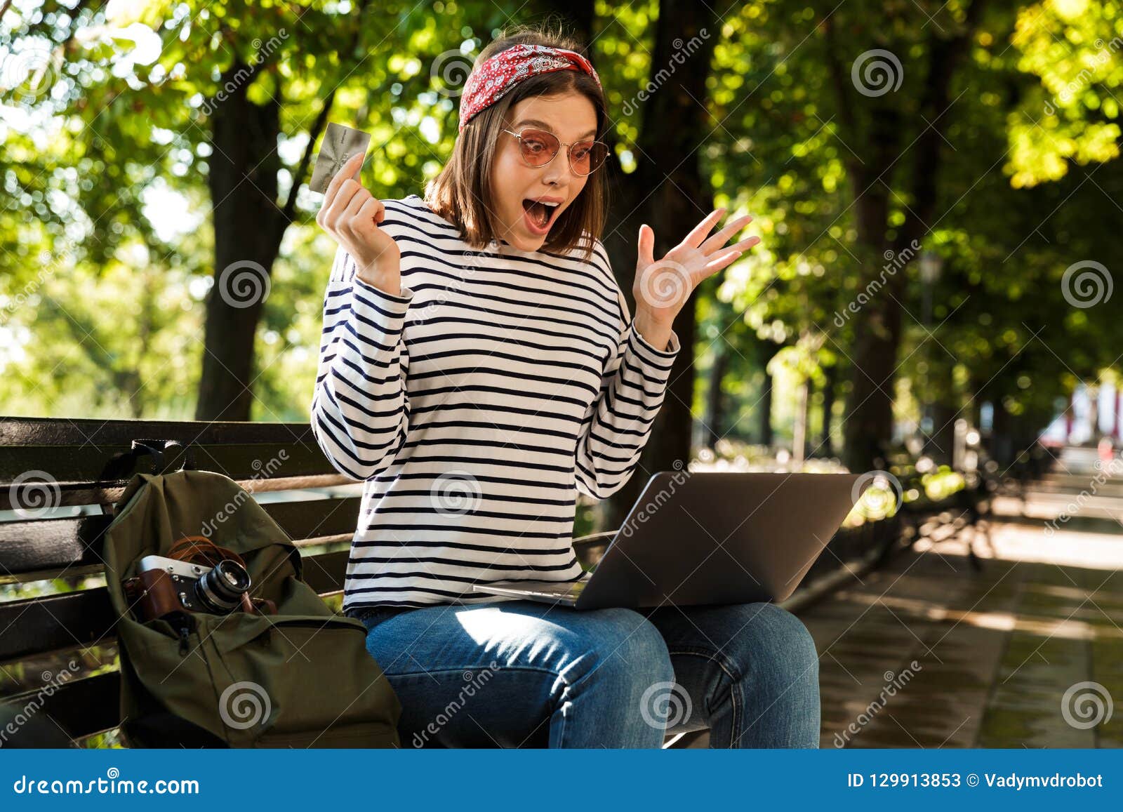 Happy Young Woman Using A Laptop Computer Stock Photo 