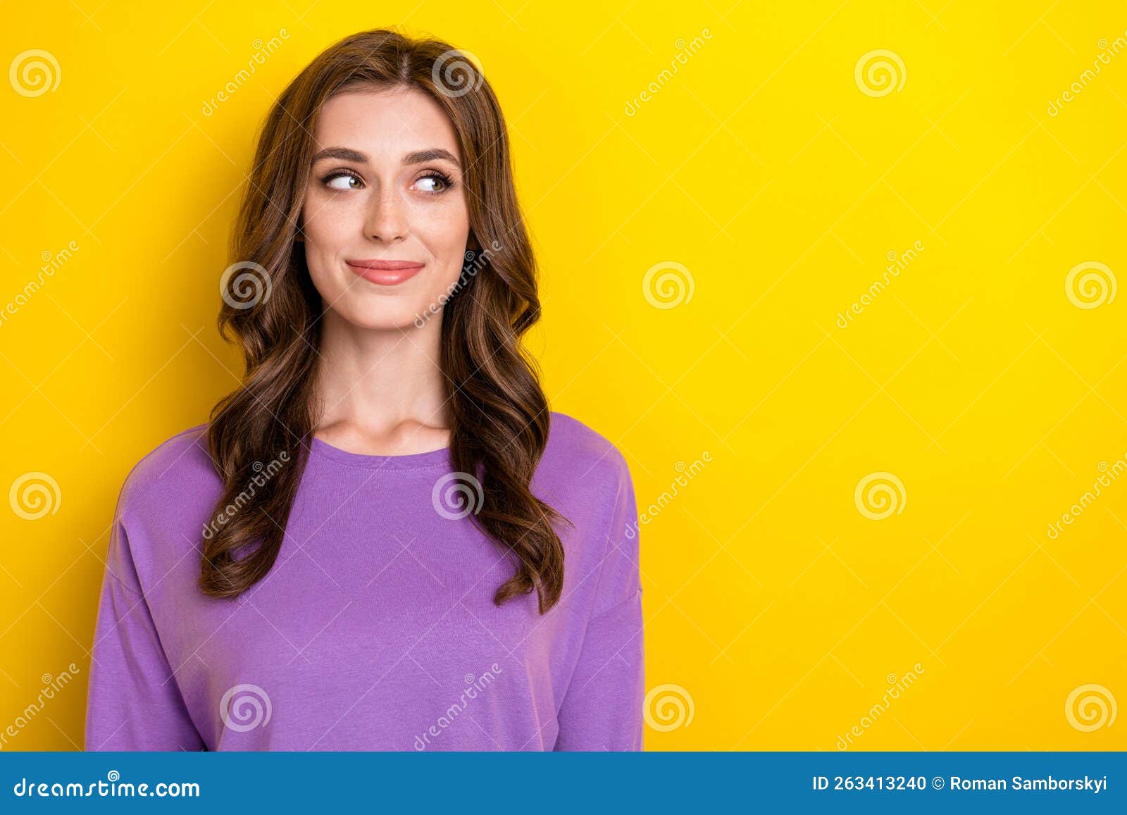 Photo of young beautiful lady wear purple pullover looking empty space advertisement minded about new vacancy isolated on yellow color background.