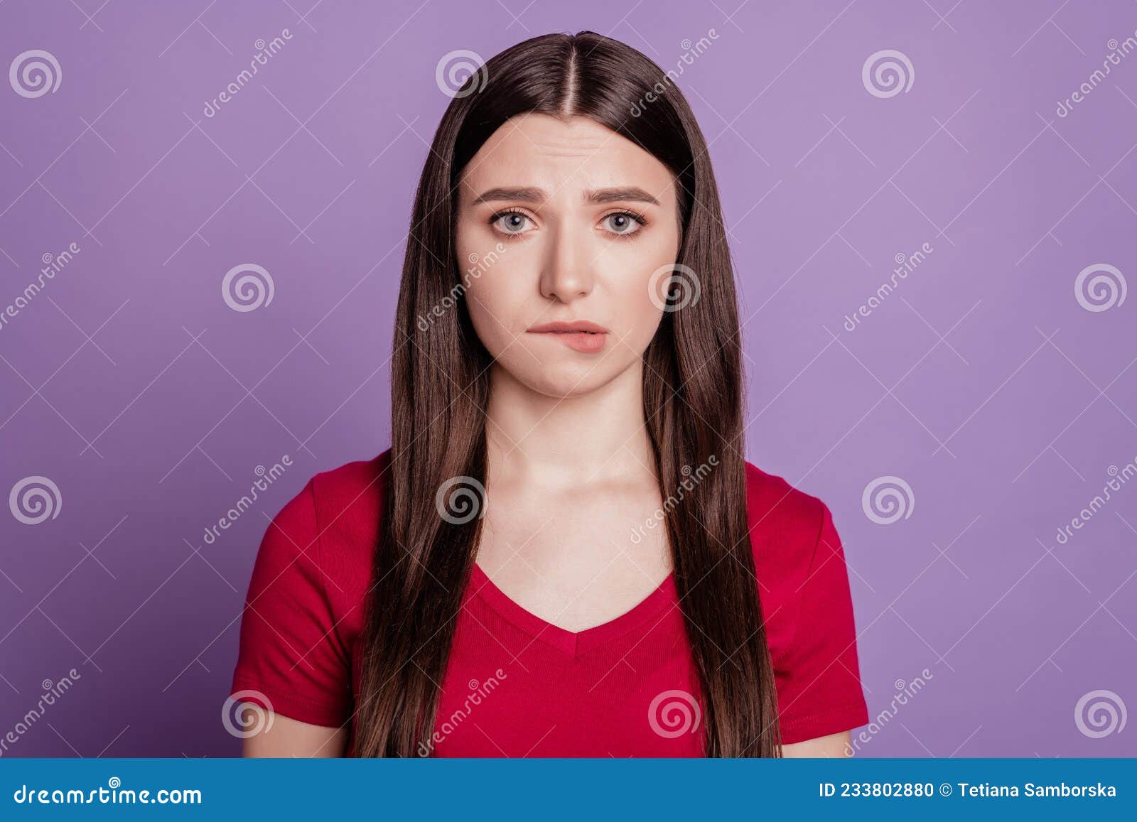 Photo Of Young Girl Unhappy Upset Worried Nervous Bite Lips Teeth Isolated Over Violet Color