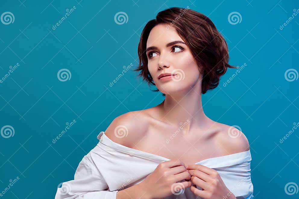 Photo of Young Woman Undress Her White Shirt Seductive Looking Empty