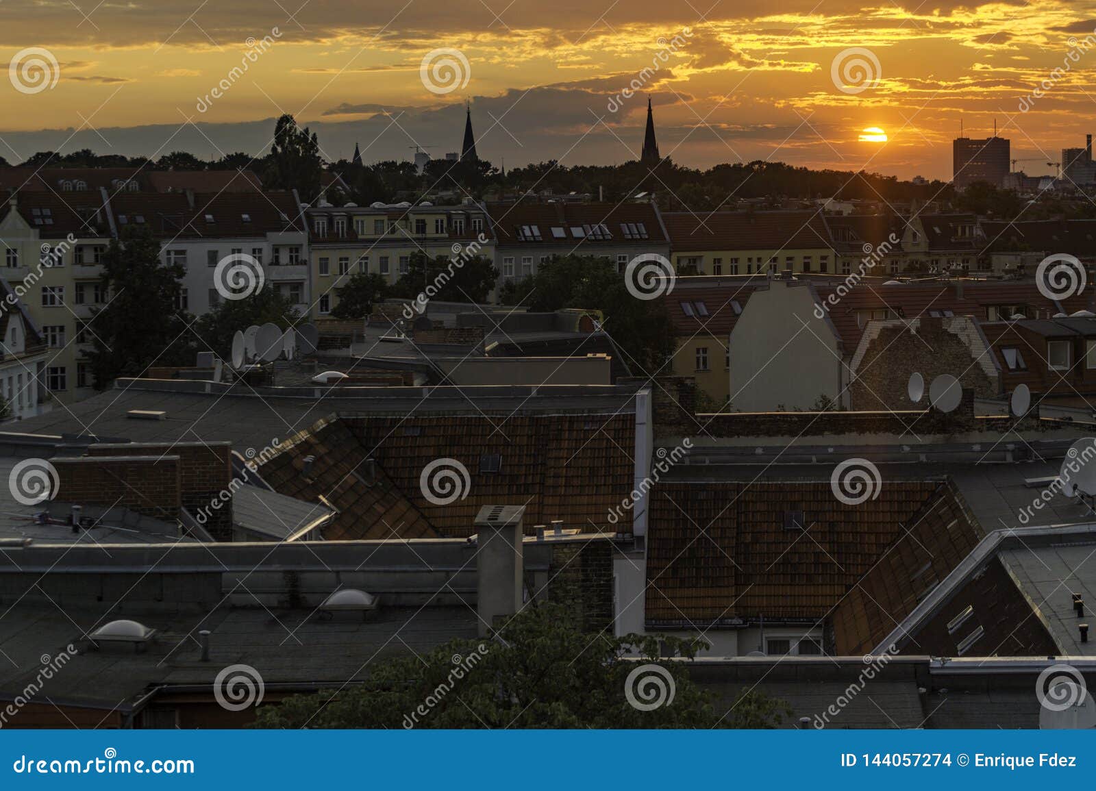 orange sky at sunset in berlin, germany