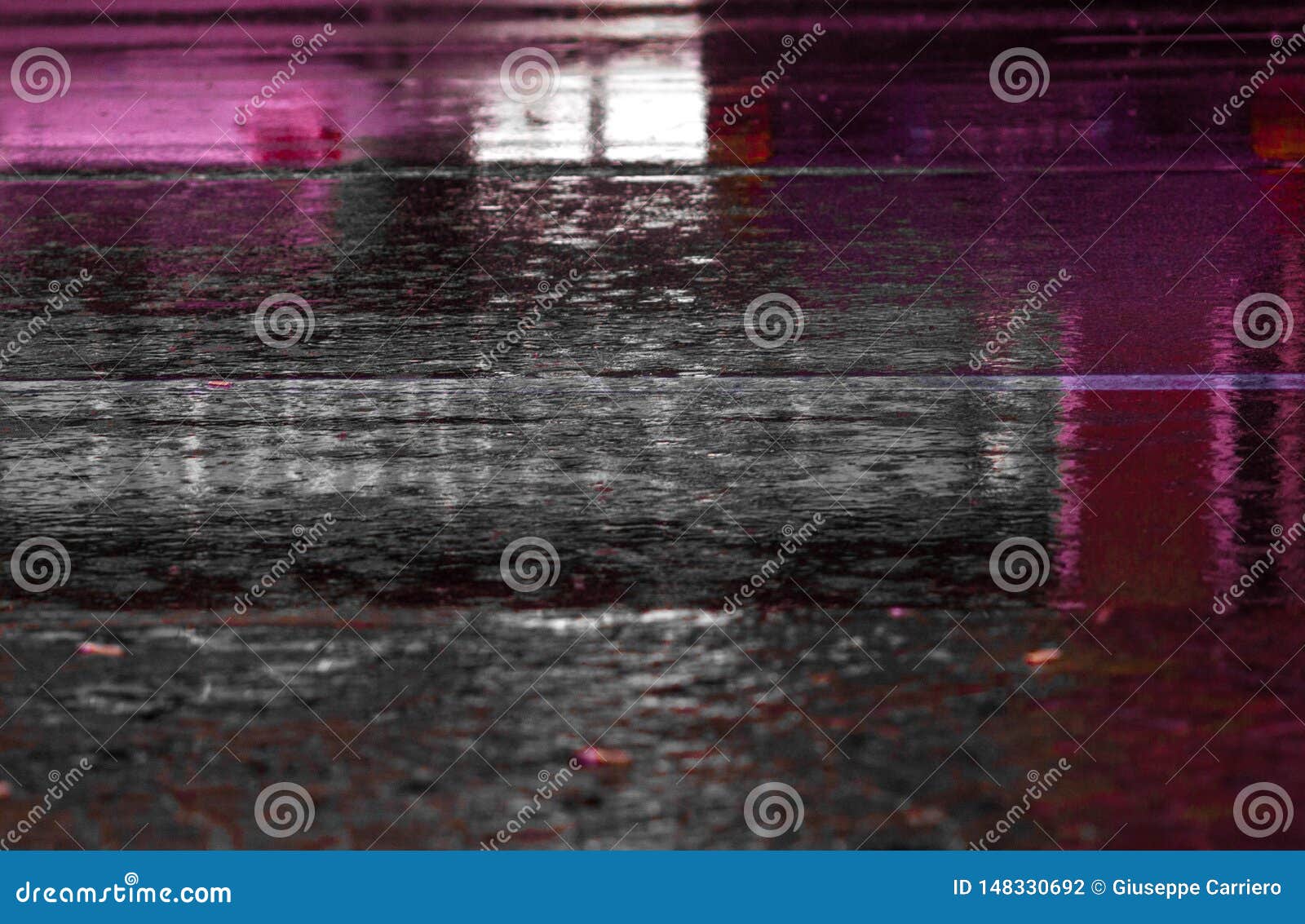Photograph of a Paved Road during the Rain. Background Stock Photo