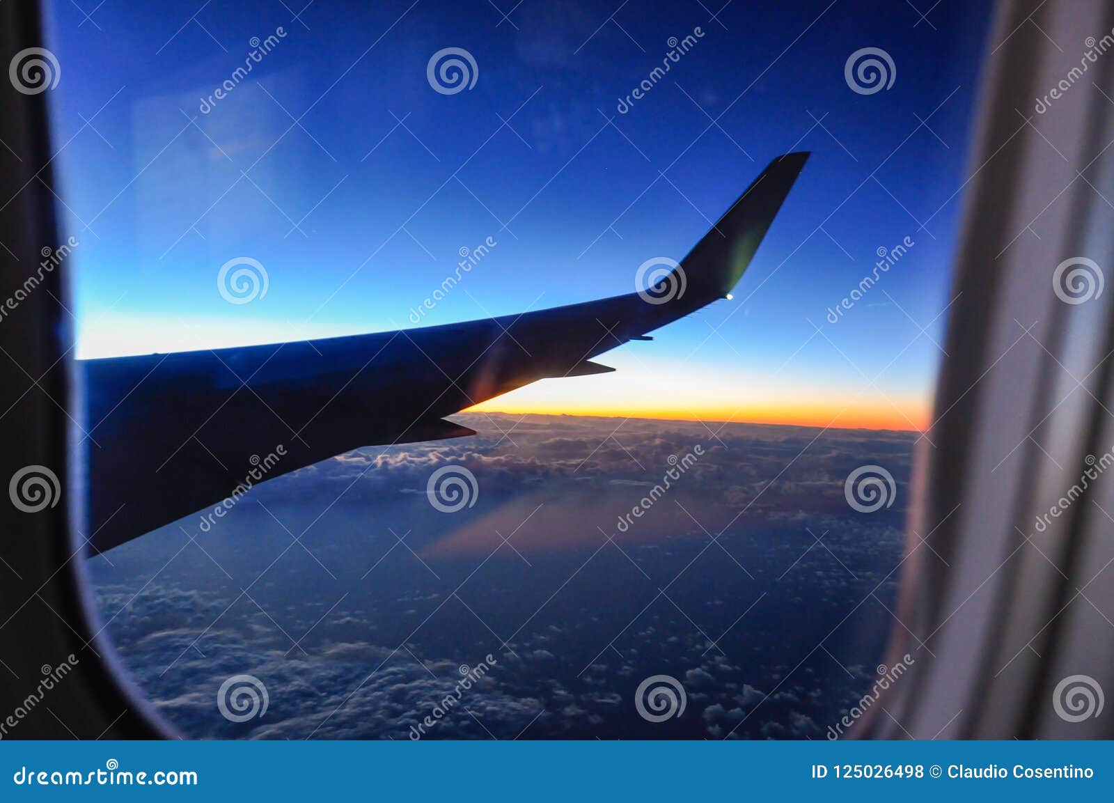 photograph of the wing of an airplane from inside.