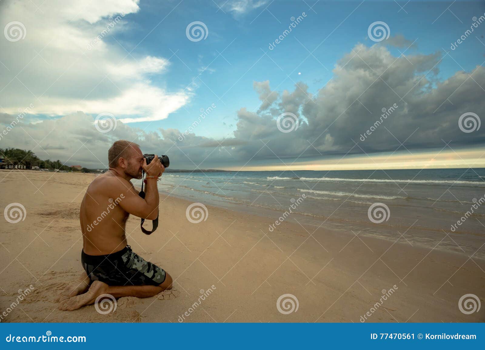 Photographer on the beach stock image. Image of career 77470561