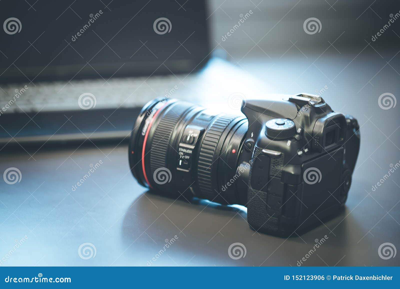 Photographer Holds a Reflex Camera with Telephoto Lens in His Hand ...