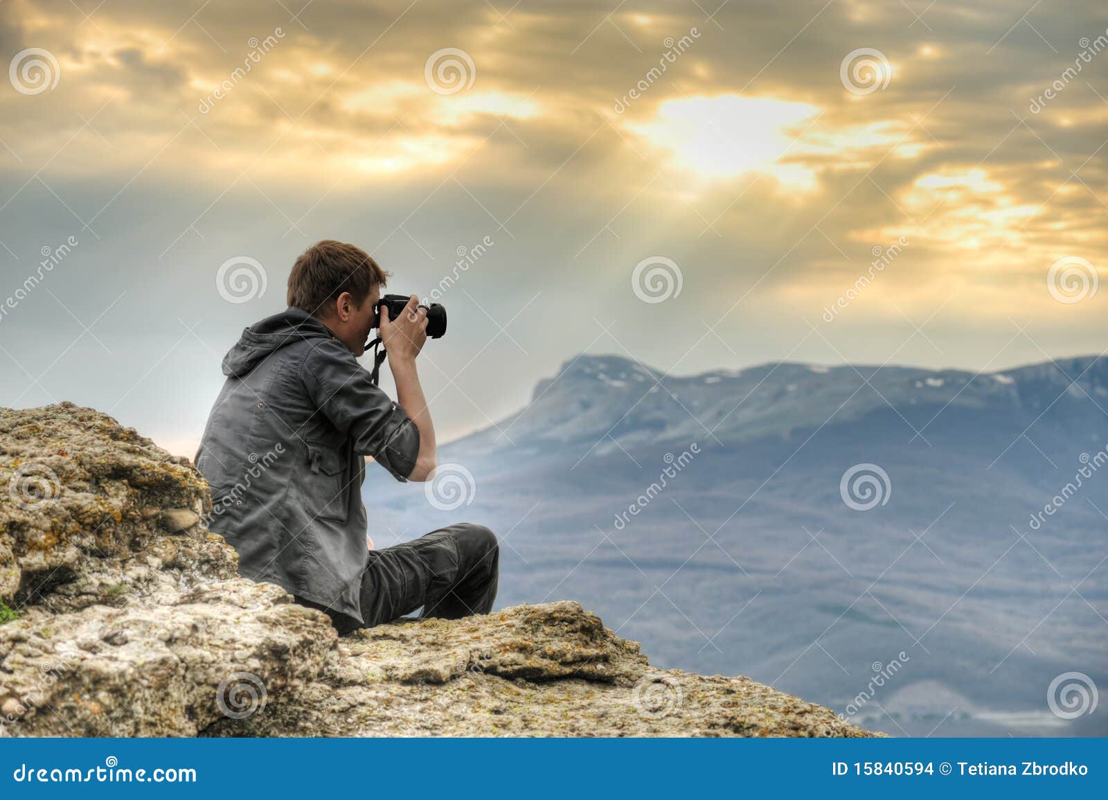 photographer on rock