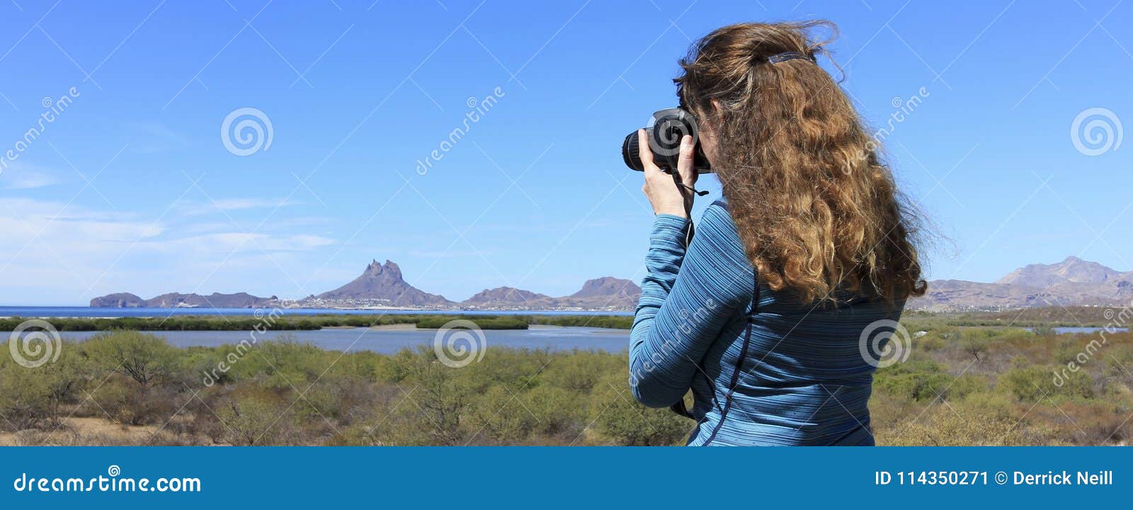 a photographer shoots tetakawi peak rising above san carlos, the