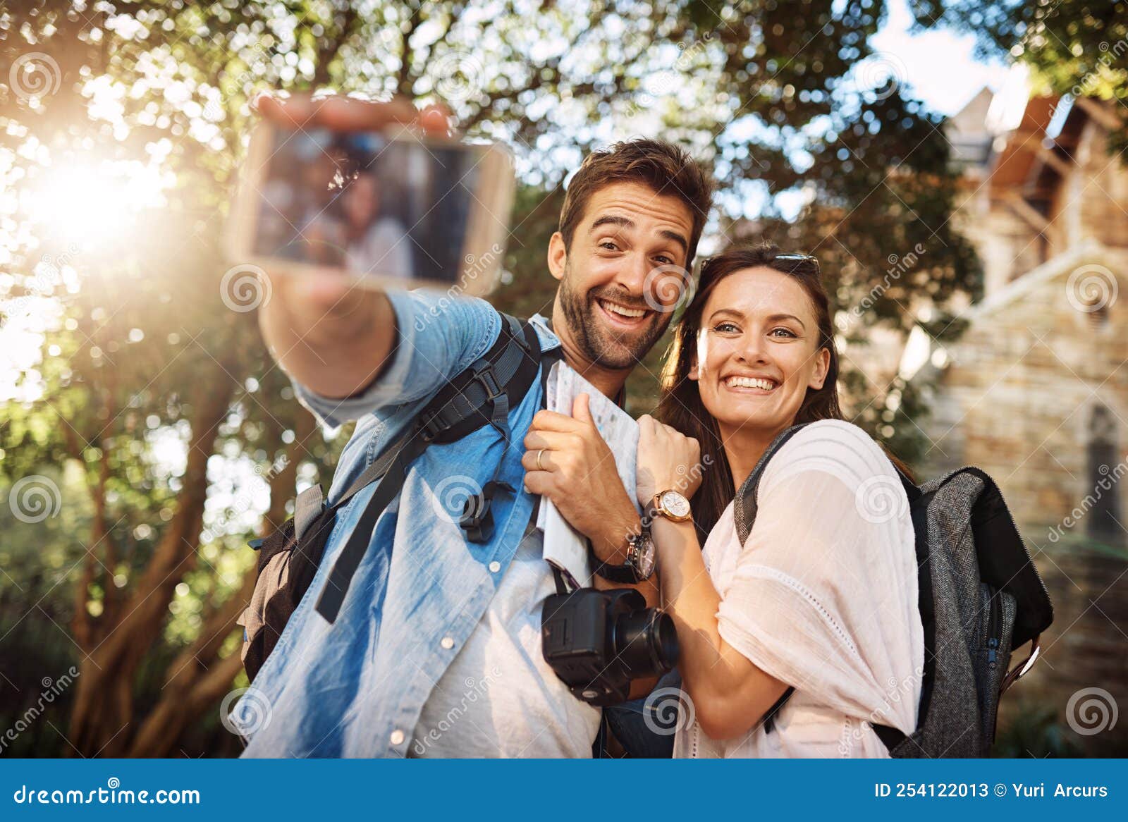 Couple posing for selfie near campfire - Stock Image - F016/6942 - Science  Photo Library