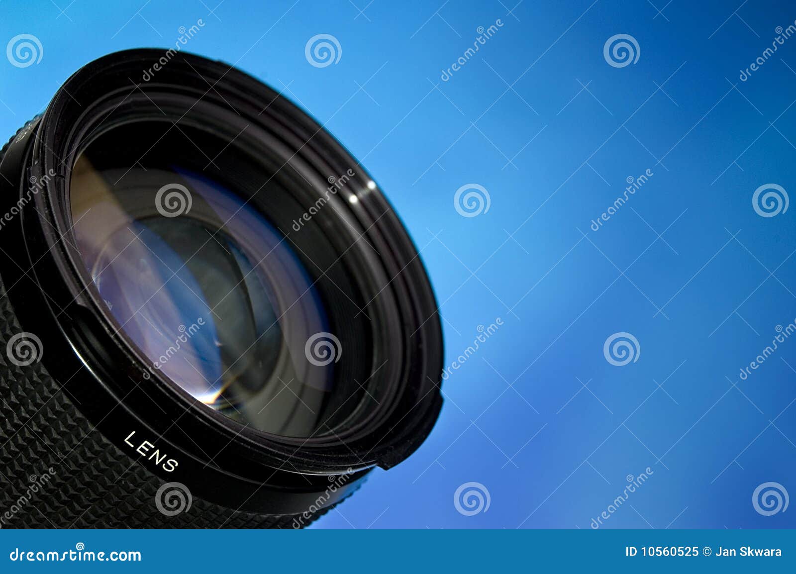 Photography lens over blue stock image. Image of dslr 10560525