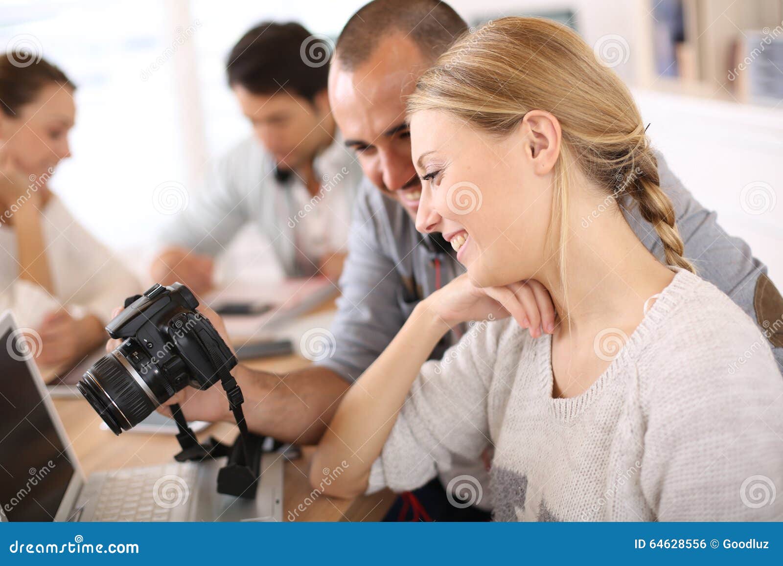 Photography Students Checking Snapshots Stock Photo - Image of friends ...