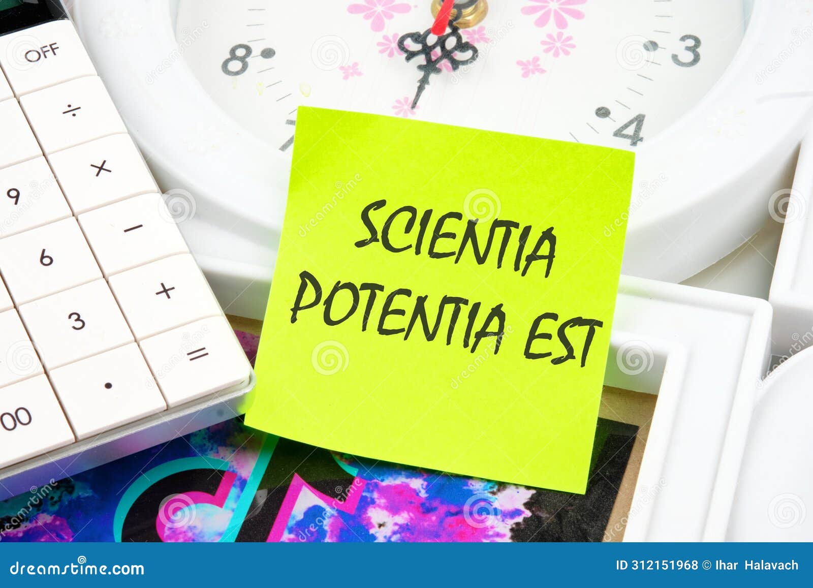 the phrase scientia potentia est (knowledge is power) written in latin