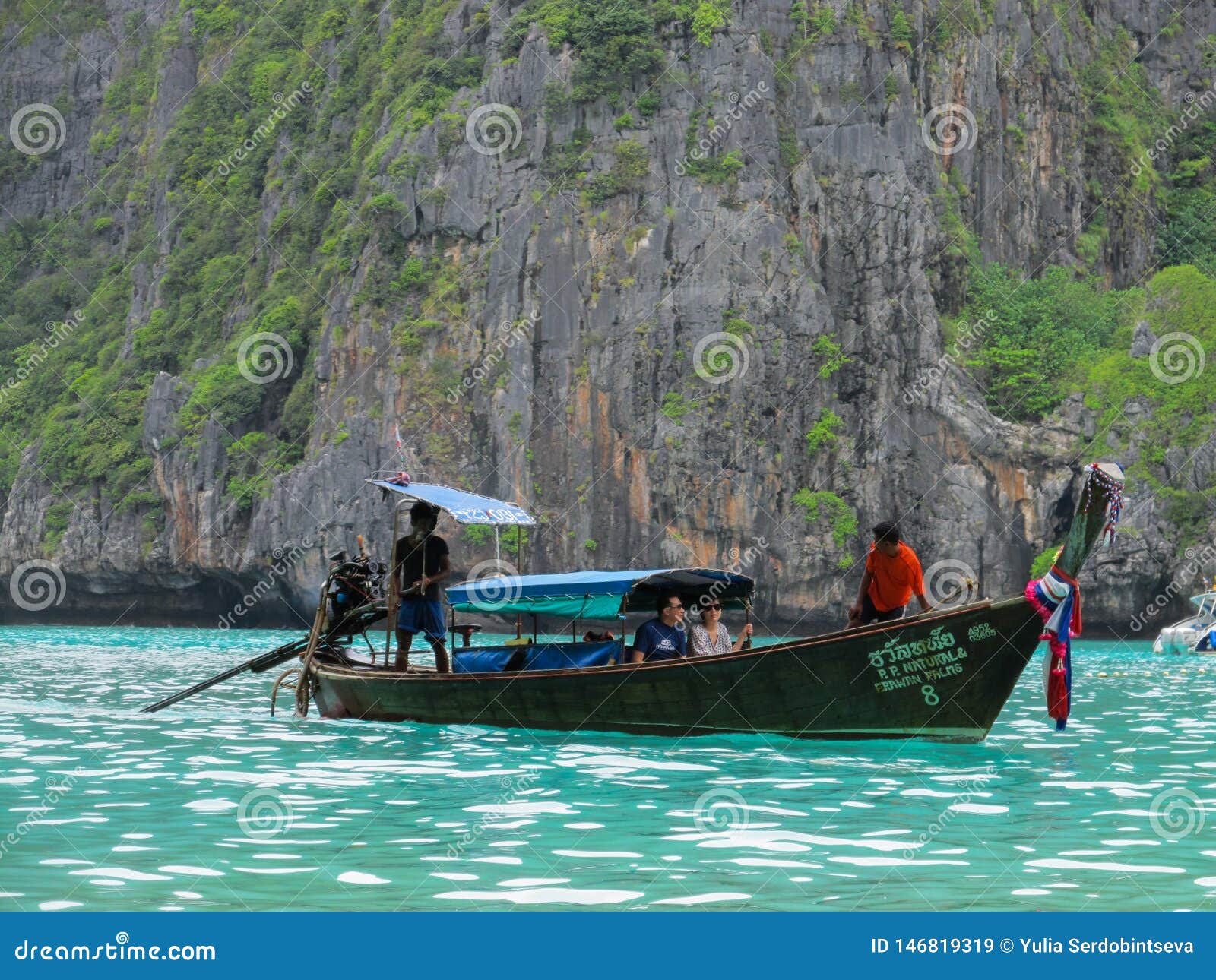 phuket, phuket thailand - 10 15 2012: wooden boat run by