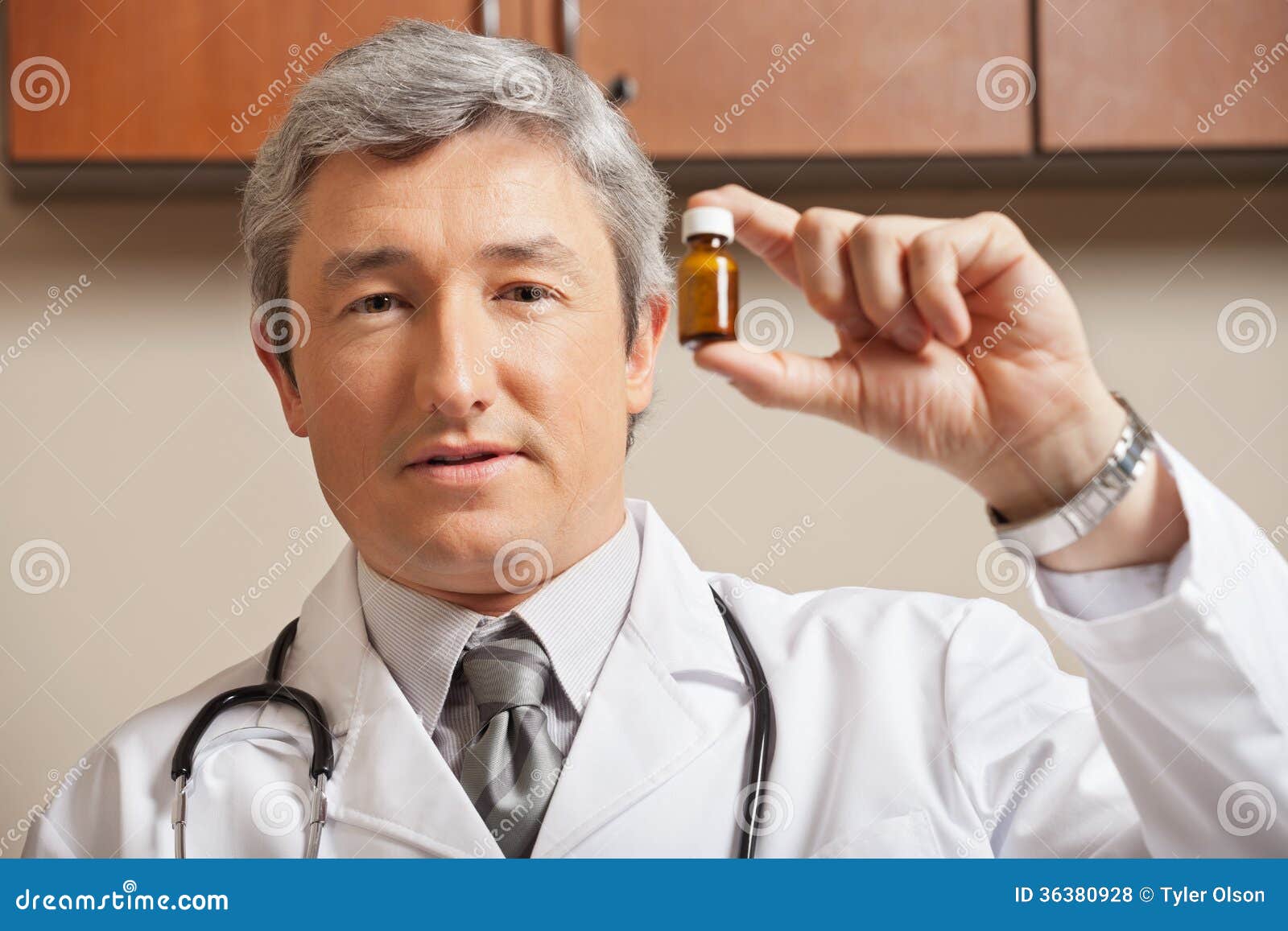 Physician Holding Medicine Bottle Stock Photo - Image of practitioner ...