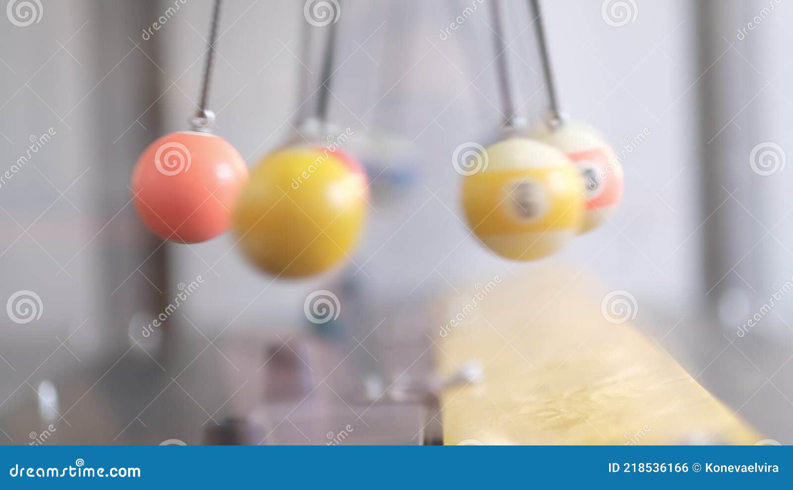 Physics Experiment Simple Newtons Cradle in Motion, Closeup. Metal