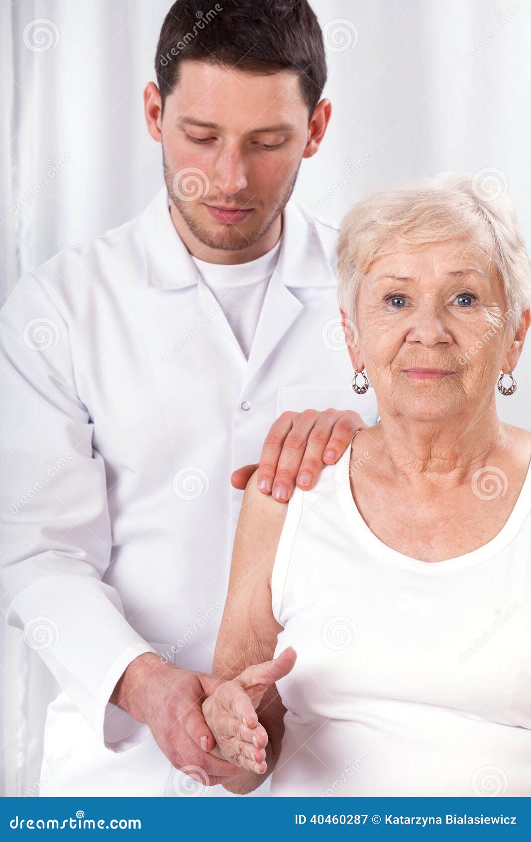Physiotherapist Checking Arm Motor Abilities Stock Image Image of