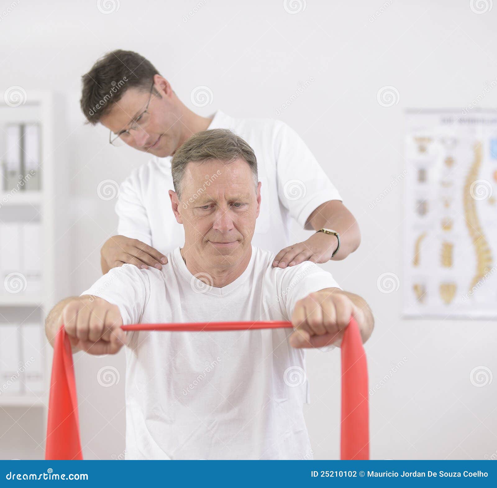 physiotherapy: senior man and physiotherapist