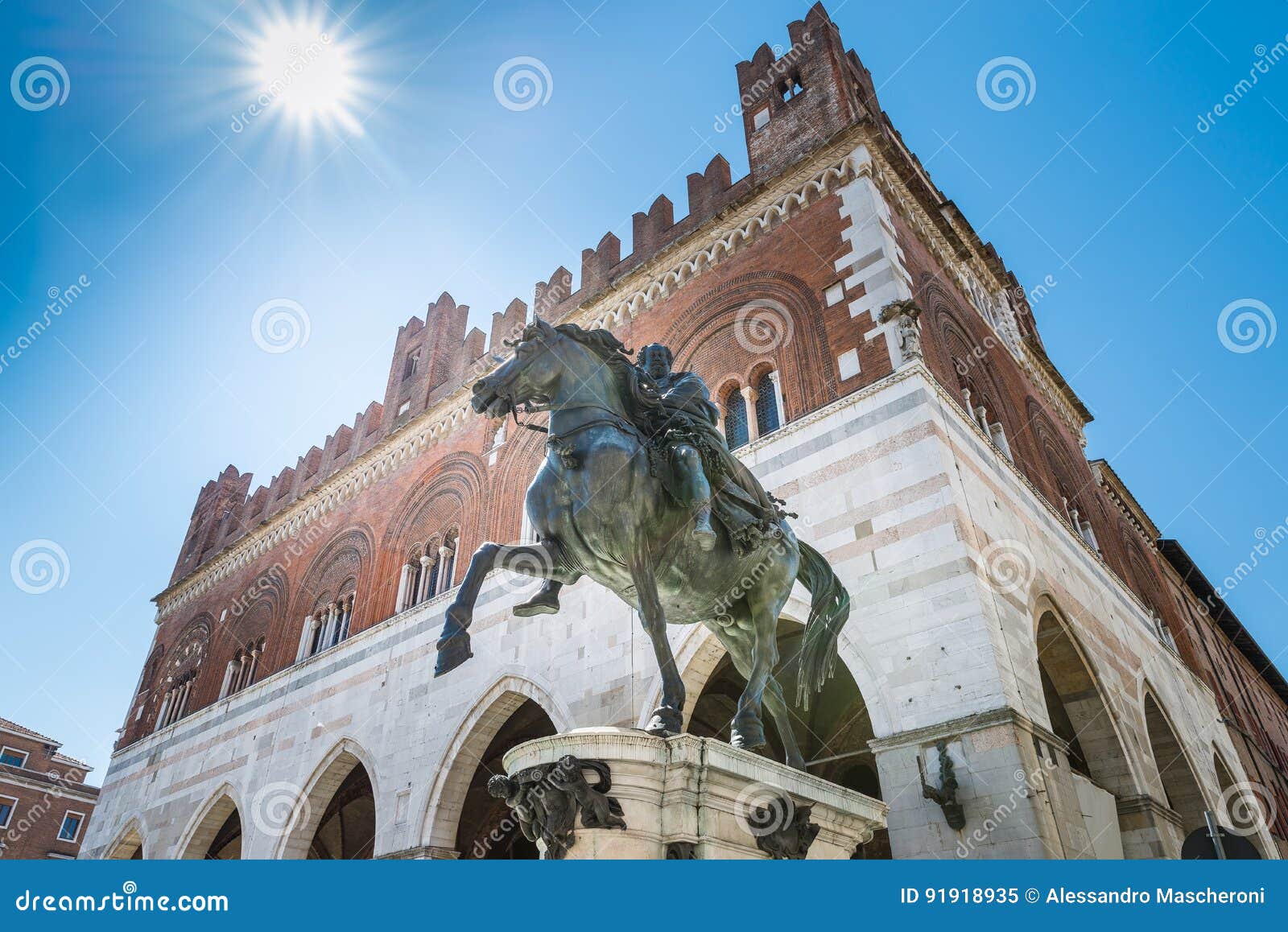 piacenza, medieval town, italy. piazza cavalli, equestrian monument and palazzo gotico in the city center