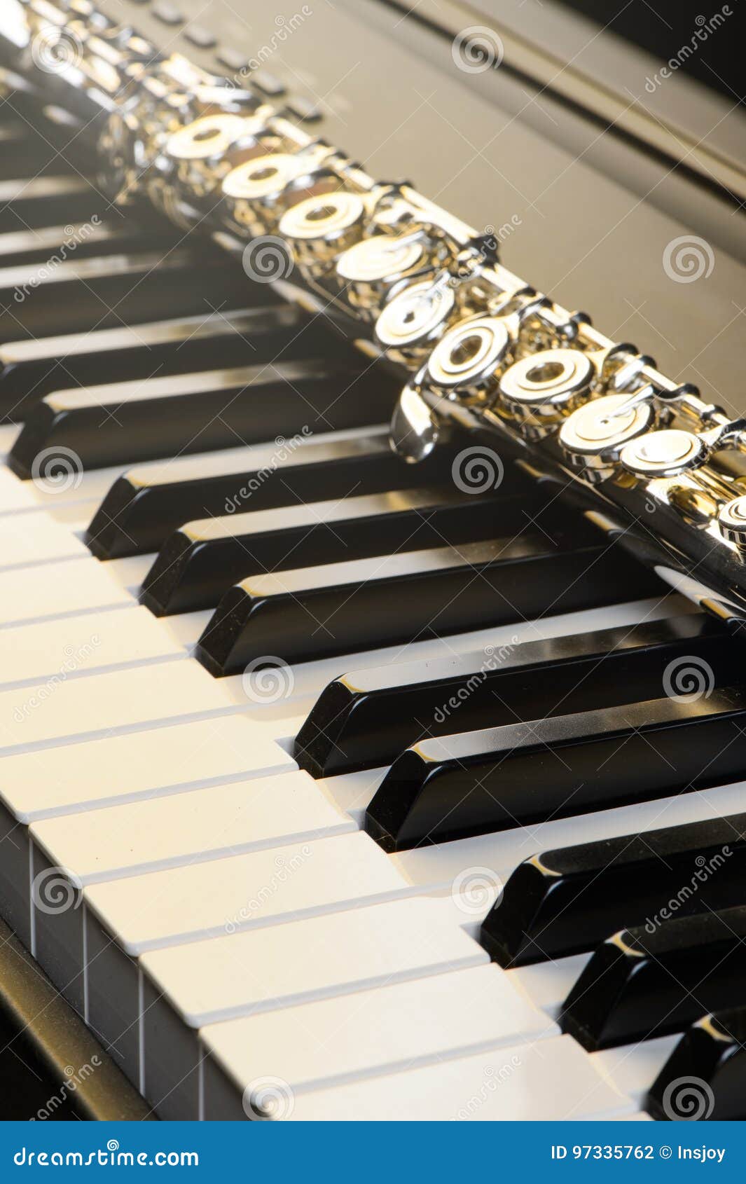 Piano and Flute with Golden Shine and Sheet Music. Horizontal