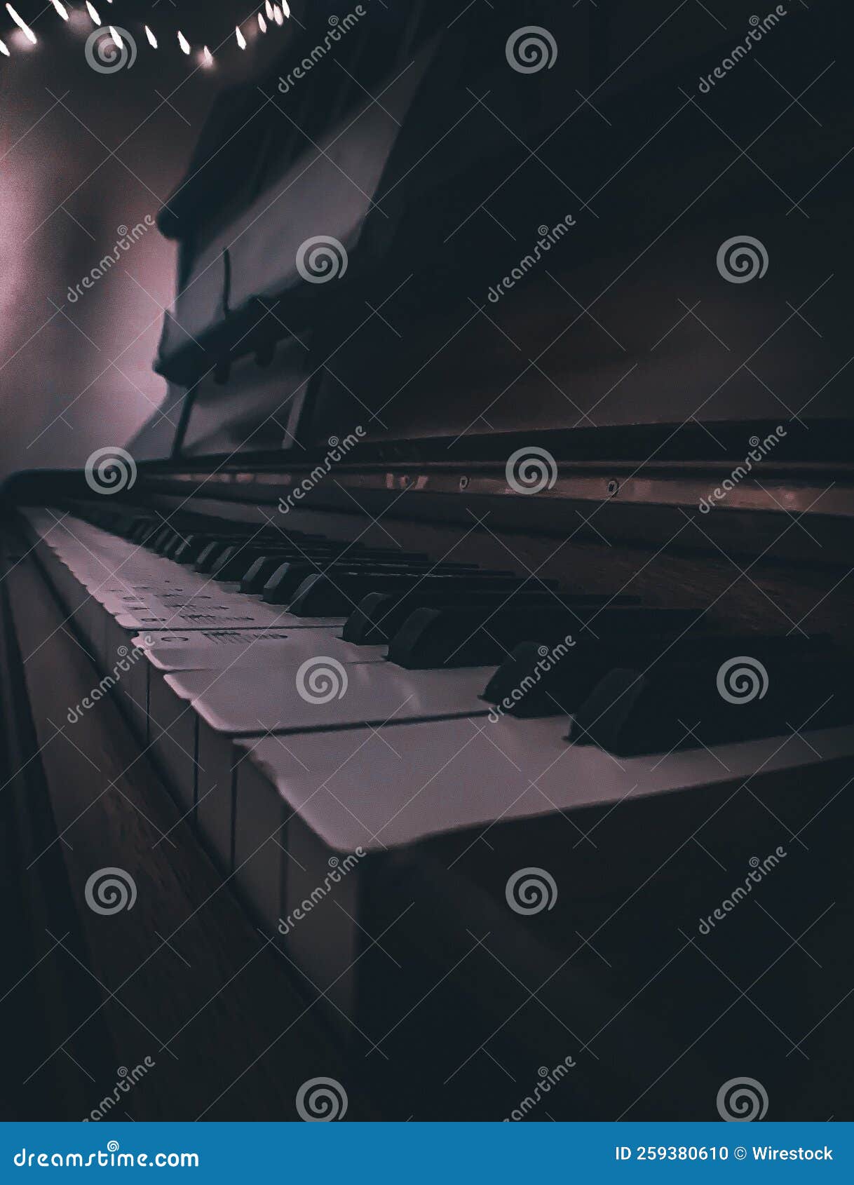 Piano Keys with Dramatic Lighting, Close-up, Vertical, Background for a