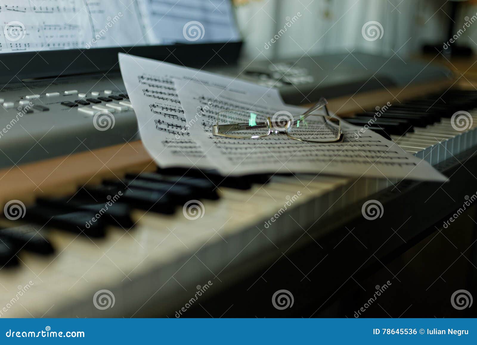 Piano with Notes and Glasses Stock Photo Image of spectacles