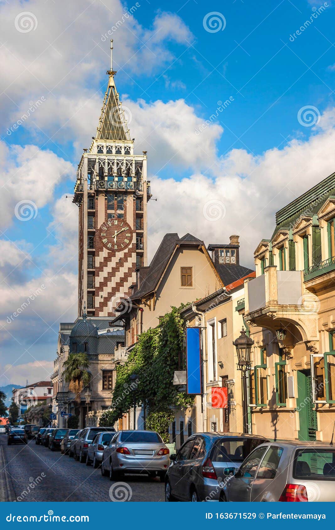 piazza clock tower in batumi. european historical buildings and stone pavemant in the city centre in resort town.