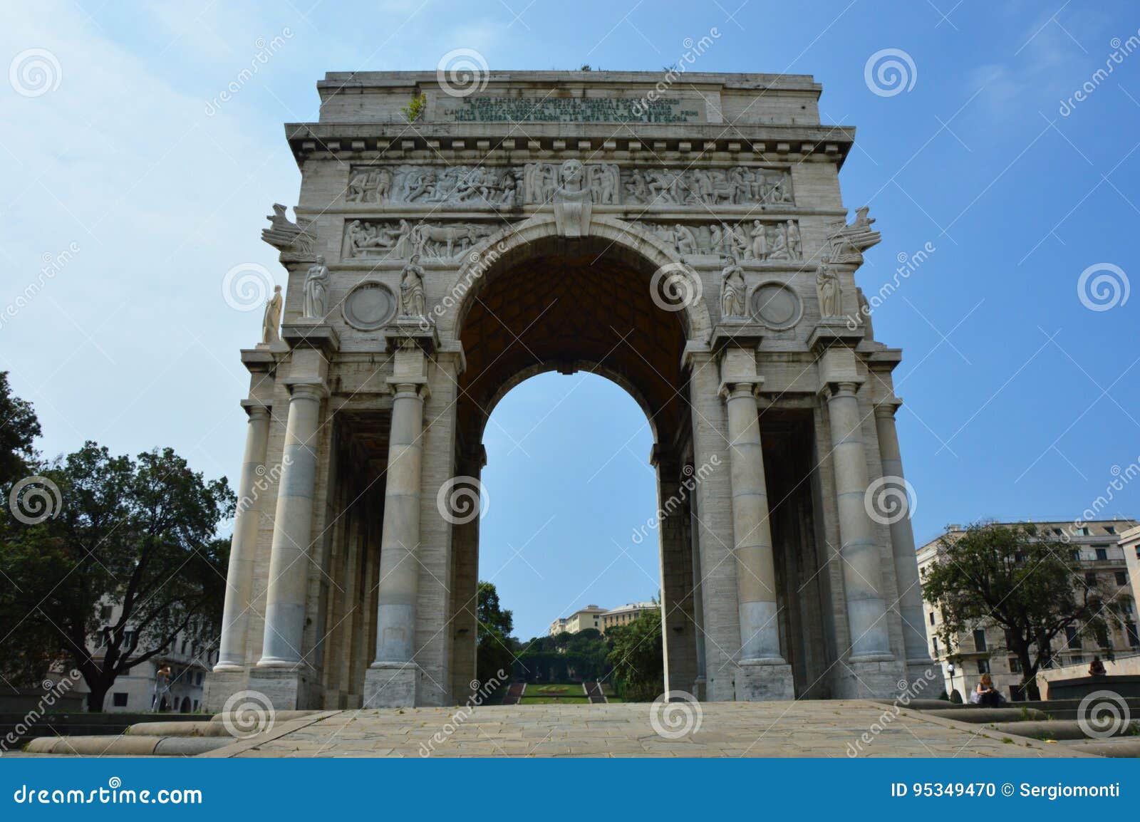 piazza della vittoria - victory square in genoa with the arc of triumph, liguria, italy