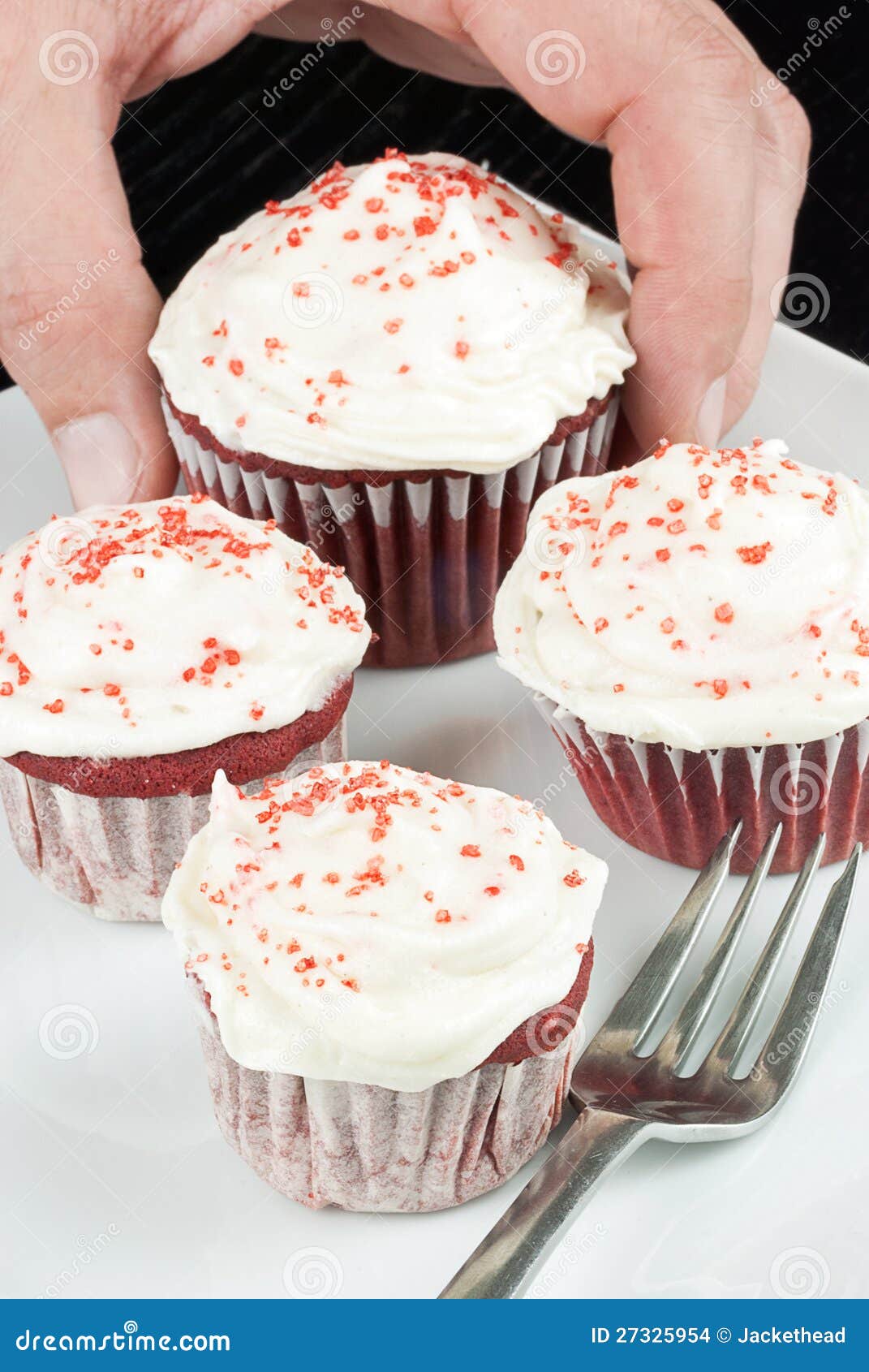 Picking the Biggest Cupcake Stock Photo - Image of cream, picking: 27325954