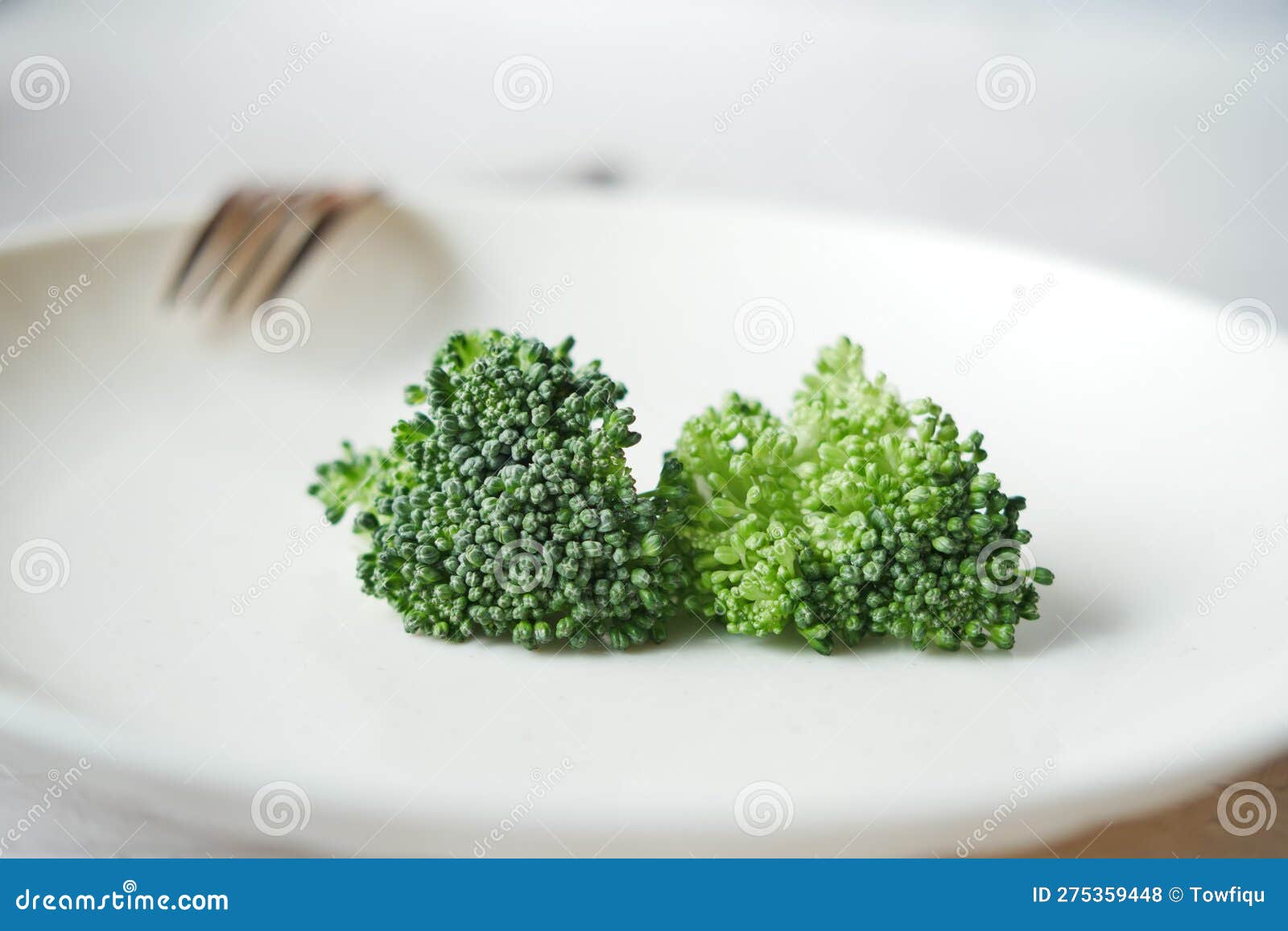 Picking Raw Broccoli with Fork Stock Photo Image of dieting, nourishment 275359448