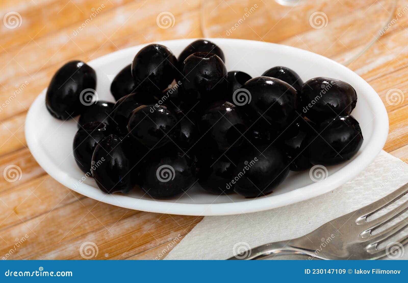 Pickled Black Olives in White Bowl Stock Image Image of marinated