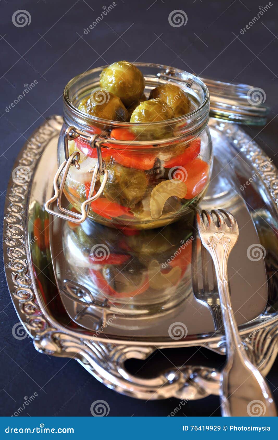 Pickled brussel sprouts stock image. Image of contrast 76419929