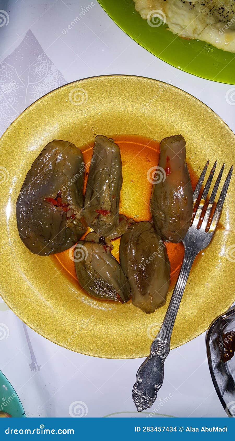 Pickled eggplant dish. stock photo. Image of fork, green 283457434