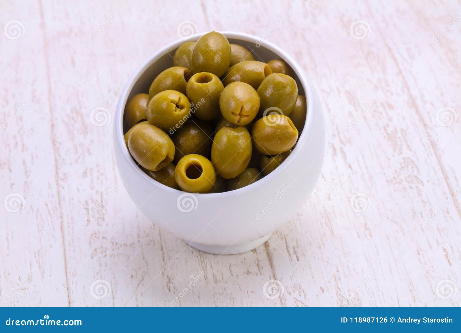 Pickled olives in the bowl stock photo. Image of appetizer 118987126