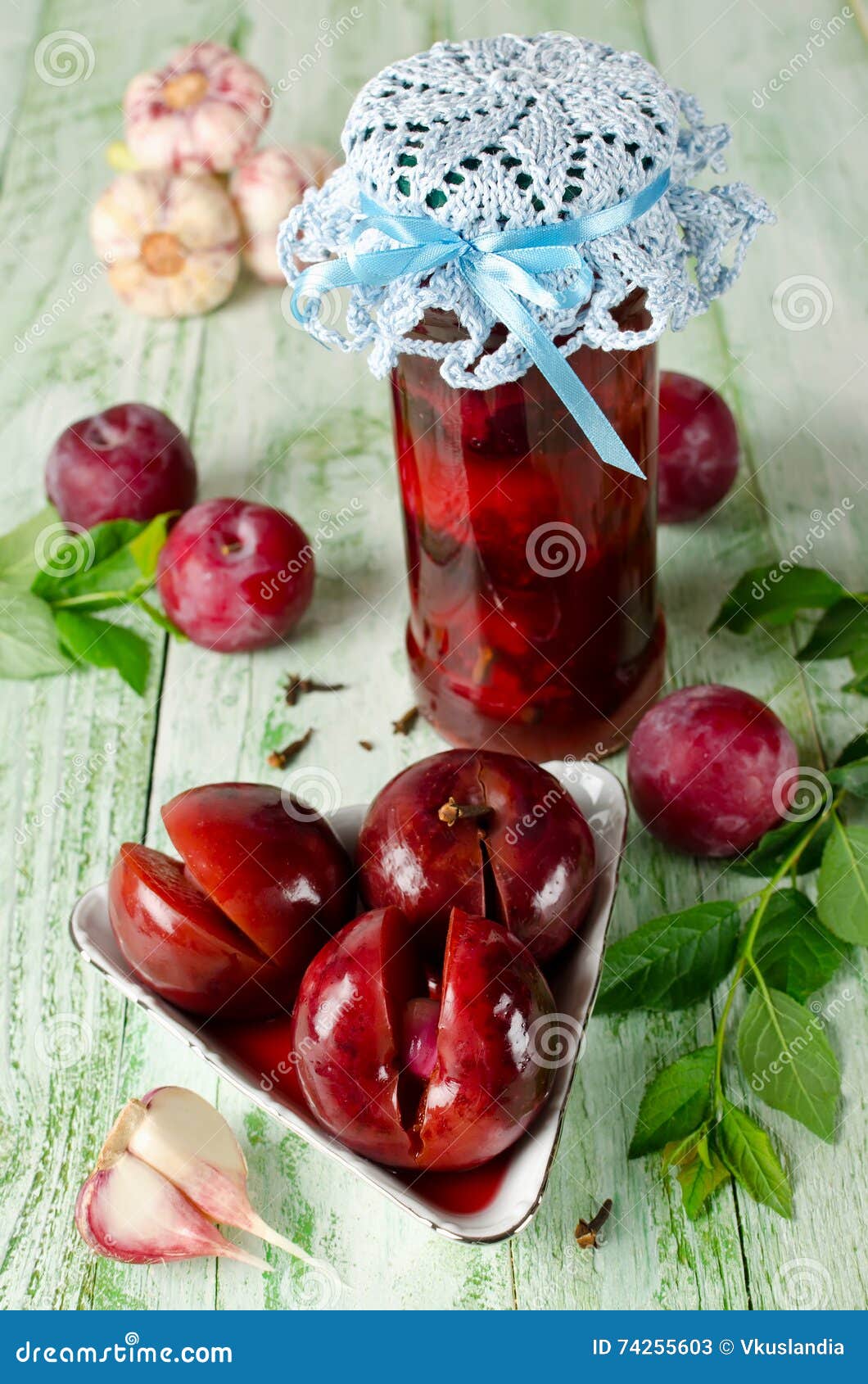 Pickled plum with garlic stock image. Image of bowl, bottle - 74255603