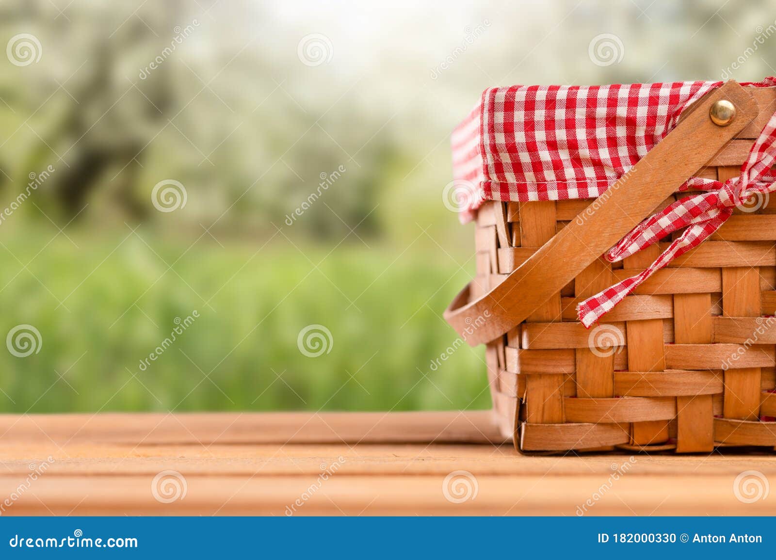 Picnic Basket On A Table Against The Background Of Nature Rest And