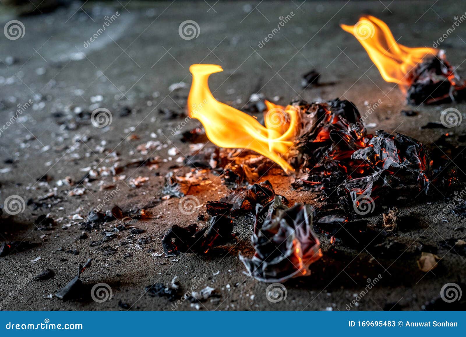 Picture Of A Fire Burning Paper On The Ground Stock Image - Image of